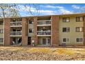Apartment building with exterior stairwell, balconies and green painted brick at 1283 Schaub Dr # B, Raleigh, NC 27606