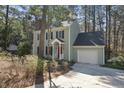Inviting two-story home with attached garage and manicured landscaping at 4815 Fortunes Ridge Dr, Durham, NC 27713