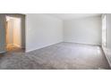 Bright living room with neutral carpet and ample natural light at 121 Westview Dr # 43, Carrboro, NC 27510