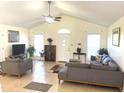 Spacious living room with vaulted ceiling and stylish modern furnishings at 1721 Daniels Farm Rd, Mebane, NC 27302