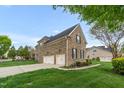 Spacious three car garage with extended driveway and well maintained lawn at 1808 Pattersons Mill Rd, Durham, NC 27703