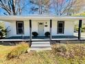 Inviting single-story home with a covered front porch and classic design elements at 602 Dexter St, Rocky Mount, NC 27803