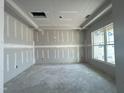Unfinished living room featuring a large window and grey walls at 1547 Pecan Drive # 31, Nashville, NC 27856