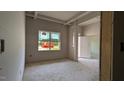 Unfinished bedroom with bright window view and white trim at 1565 Pecan Drive # 30, Nashville, NC 27856