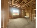 An interior shot of a new home's framing with a large window at 1565 Pecan Drive # 30, Nashville, NC 27856
