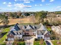 Gorgeous aerial view of spacious homes in planned community surrounded by lush green landscapes at 2308 Carriage Oaks Dr, Raleigh, NC 27614