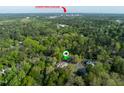 Aerial view of neighborhood, tree-lined streets, and the location of downtown Durham at 2603 Vineyard St, Durham, NC 27707