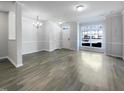 Spacious living room with hardwood floors and a bright atmosphere at 350 Gilman Ln # 104, Raleigh, NC 27610