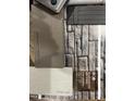 Home design selections featuring stone veneer, luxury vinyl plank, and neutral paint swatches at 85 Prency Ln, Middlesex, NC 27557