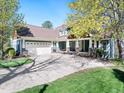 Attractive home with a spacious driveway leading to a large garage and covered porch at 904 Hidden Jewel Ln, Wake Forest, NC 27587