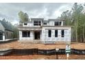 Exterior of new build home with modern design and visible construction materials at 95 Cherry Bark Dr, Youngsville, NC 27596
