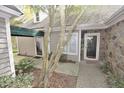 A covered walkway leads to a stone and siding home at 29 Mocking Ln, Rocky Mount, NC 27804