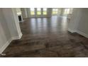 Spacious living room with lots of natural light and wood flooring at 644 Sweet Potato Lane # 36, Nashville, NC 27856