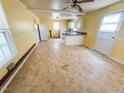 Spacious kitchen with white cabinets, an island, and room for dining at 1324 Buffalo Rd, Smithfield, NC 27577