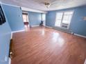 Inviting living room with wood floors, freshly painted walls, and natural light at 1324 Buffalo Rd, Smithfield, NC 27577