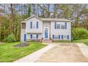 Inviting two-story home with a well-maintained lawn and a spacious driveway at 2816 Delco Ct, Raleigh, NC 27610