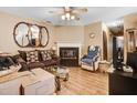 Comfortable living room with fireplace, ceiling fan, and ample space for relaxation at 4118 Sudbury Rd, Durham, NC 27704