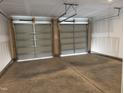 Spacious two-car garage with ample room for vehicles and storage at 75 Furley St., Homesite 115, Sanford, NC 27330