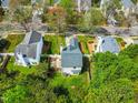Overhead shot of a home showing its backyard, landscaping, and proximity to other residences at 200 Adefield Ln, Holly Springs, NC 27540