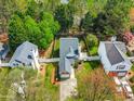 Bird's-eye view of a well-maintained home with a fenced backyard and lush green surroundings at 200 Adefield Ln, Holly Springs, NC 27540