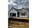 New construction home showcasing stylish gray siding and an attached two-car garage at 34 E American Marigold Dr # 64, Benson, NC 27504