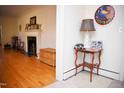 Inviting living room with hardwood floors and a cozy fireplace at 711 Evergreen Rd, Rocky Mount, NC 27803
