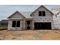 Under construction, this beautiful home features a spacious layout, promising comfort and style at 771 Old Station Pointe, Angier, NC 27501
