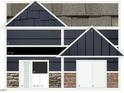 Samples of exterior finish selections offer a glimpse into design choices for home at 771 Old Station Pointe, Angier, NC 27501