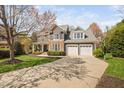 Lovely home with an attached two-car garage, covered porch and long driveway perfect for suburban living at 1204 Croydon Glen Ct, Cary, NC 27519