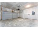 Spacious garage with automatic door, room for two cars and storage at 168 Bruce Dr, Dunn, NC 28334