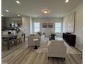 Cozy living room features neutral tones, plush seating, and stylish decorative accents at 168 Bruce Dr, Dunn, NC 28334