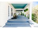 Inviting front porch with classic rocking chairs, offering a relaxing outdoor space at 211 W Chisholm St, Sanford, NC 27330