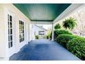 Relax on this home's spacious front porch with swing, perfect for enjoying the outdoors at 211 W Chisholm St, Sanford, NC 27330