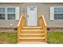 Low angle of the brand new front stairs and porch at 305 Eastfield Dr, Rocky Mount, NC 27801