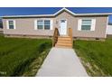 Straight shot of the new porch and walkway to the property at 305 Eastfield Dr, Rocky Mount, NC 27801