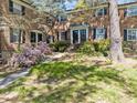 Charming townhouse exterior with lush landscaping and a welcoming entrance at 3743 Yorktown Pl, Raleigh, NC 27609