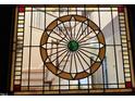 Close-up of the stained-glass front door, highlighting its intricate design and unique details at 8508 Kayenta Ct, Wake Forest, NC 27587