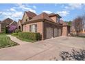 Spacious brick home with a three car garage and well manicured landscaping at 915 Dunleigh Dr, Burlington, NC 27215