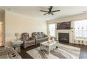 Comfortable living room with fireplace and TV at 1102 Dartmouth Dr, Mebane, NC 27302