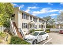 Comfortable townhouse showcasing its inviting entrance and outdoor landscape at 2306 Stafford Ave # A, Raleigh, NC 27607