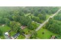 Aerial view of neighborhood showcasing mature trees, grassy terrain and homes at 4508 Old Us 421 N, Siler City, NC 27344
