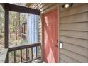 Close-up of the front door with a video doorbell and outdoor lighting at 103 Morningside Dr, Carrboro, NC 27510