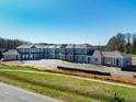 New two-story home construction is well underway on a sunny day at 110 Bellamy Ln # 108, Chapel Hill, NC 27516