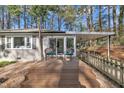 Inviting porch with a seating area, providing a welcoming entrance to this charming home with covered parking at 3022 Dixon Rd, Durham, NC 27707