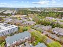 Panoramic aerial view showcases the community's lush surroundings and cityscape at 800 Moratuck Dr # 108, Raleigh, NC 27604