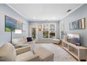 Bright living room featuring neutral tones and ample natural light at 800 Moratuck Dr # 108, Raleigh, NC 27604