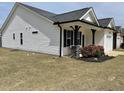 A charming single story home featuring a small yard and manicured front lawn at 11 Balboa Pkwy, Clayton, NC 27520