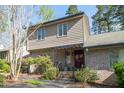 Charming home with brick facade, awning, and well-maintained landscaping at 114 Montrose Dr # 114, Durham, NC 27707