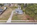 Overhead view of a charming single-story home with a well-maintained yard at 116 Lakewood Dr, Wendell, NC 27591