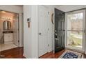 Inviting foyer with wood floors, a closet, and an open view to the bathroom at 1808 W Cotton Gin Dr, Clayton, NC 27527